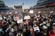 New England Patriots fans hold placards and cheer during an NFL football Super Bowl send-off rally for the team, Sunday, Jan. 27, 2019, in Foxborough, Mass. The Los Angeles Rams are to play the Patriots in Super Bowl on Feb. 3, in Atlanta, Ga. (AP Photo/Steven Senne)