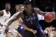 Duke's Zion Williamson (1) is defended by Notre Dame's Dane Goodwin (23) during the first half of an NCAA college basketball game Monday, Jan. 28, 2019, in South Bend, Ind. (AP Photo/Robert Franklin)