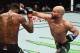 MONCTON, NB - OCTOBER 27: (R-L) Artem Lobov of Russia punches Michael Johnson in their featherweight bout during the UFC Fight Night event inside Avenir Centre on October 27, 2018 in Moncton, New Brunswick, Canada. (Photo by Jeff Bottari/Zuffa LLC/Zuffa LLC via Getty Images)