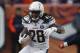 Los Angeles Chargers running back Melvin Gordon rushes during the second half of an NFL football game against the Denver Broncos, Sunday, Dec. 30, 2018, in Denver. (AP Photo/David Zalubowski)