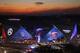 The sun sets behind Mercedes-Benz Stadium ahead of Sunday's NFL Super Bowl 53 football game between the Los Angeles Rams and New England Patriots in Atlanta, Wednesday, Jan. 30, 2019. (AP Photo/David Goldman)