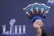 Michael, Buchwald, NFL Senior Counsel, Legal, holds up Super Bowl 53 tickets as he explains the security features on the tickets during a news conference for the NFL Super Bowl 53 football game Thursday, Jan. 31, 2019, in Atlanta. (AP Photo/David J. Phillip)