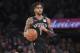 Brooklyn Nets guard D'Angelo Russell handles the ball during the second half of an NBA basketball game against the New York Knicks, Saturday, Dec. 8, 2018, at Madison Square Garden in New York. The Nets won 104-112. (AP Photo/Mary Altaffer)