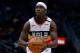NEW ORLEANS, LOUISIANA - JANUARY 30: Jrue Holiday #11 of the New Orleans Pelicans shoots during a game against the Denver Nuggets at the Smoothie King Center on January 30, 2019 in New Orleans, Louisiana. NOTE TO USER: User expressly acknowledges and agrees that, by downloading and or using this photograph, User is consenting to the terms and conditions of the Getty Images License Agreement. (Photo by Jonathan Bachman/Getty Images)