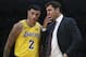 Los Angeles Lakers coach Luke Walton, right, speaks to Lonzo Ball (2) during the second half of the team's preseason NBA basketball game against the Golden State Warriors on Friday, Oct. 12, 2018, in San Jose, Calif. (AP Photo/Ben Margot)