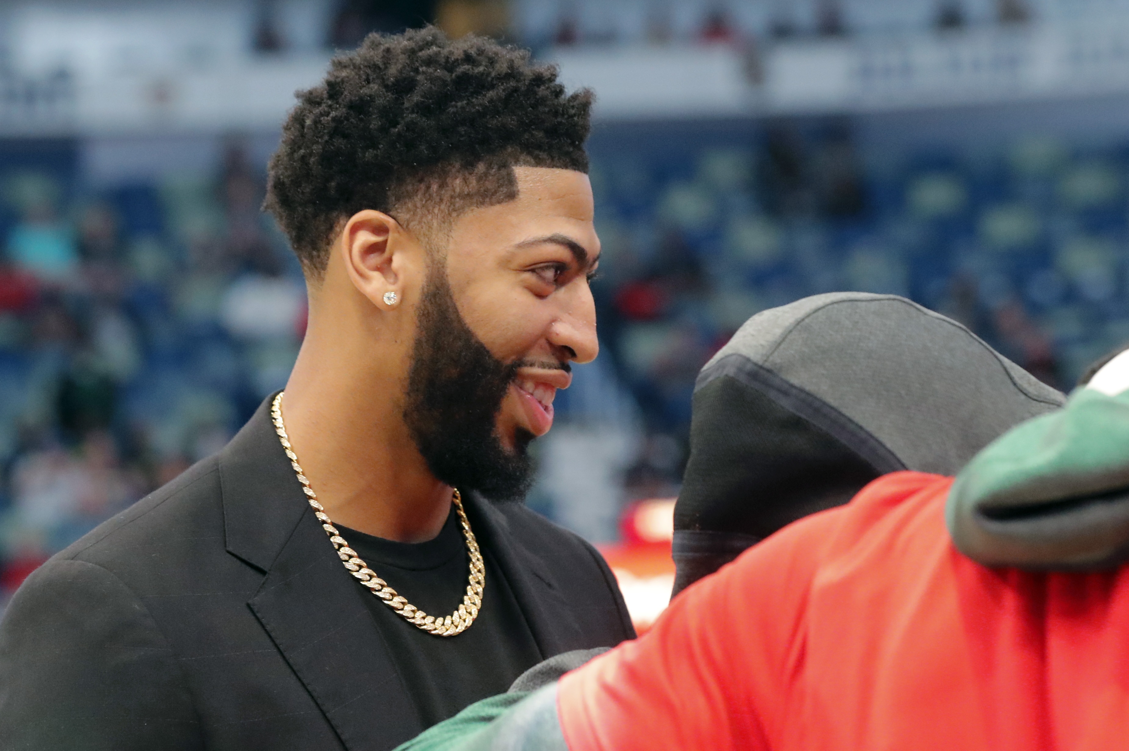 New Orleans Pelicans forward Anthony Davis huddles with teammates on the court before an NBA basketball game against the Indiana Pacers in New Orleans, Monday, Feb. 4, 2019. (AP Photo/Gerald Herbert)