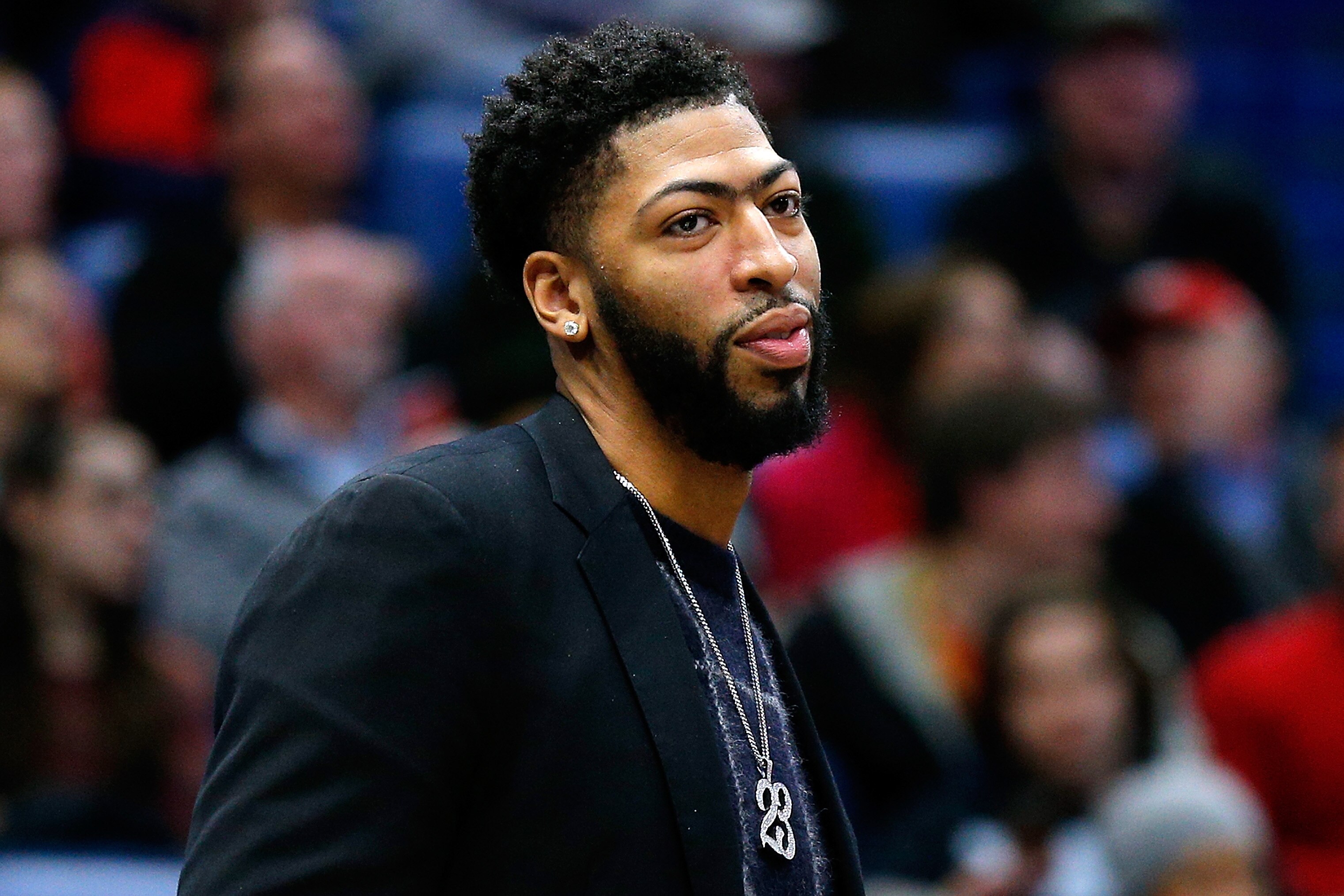 NEW ORLEANS, LOUISIANA - JANUARY 30: Injured Anthony Davis #23 of the New Orleans Pelicans reacts during the first half against the Denver Nuggets at the Smoothie King Center on January 30, 2019 in New Orleans, Louisiana. NOTE TO USER: User expressly acknowledges and agrees that, by downloading and or using this photograph, User is consenting to the terms and conditions of the Getty Images License Agreement. (Photo by Jonathan Bachman/Getty Images)