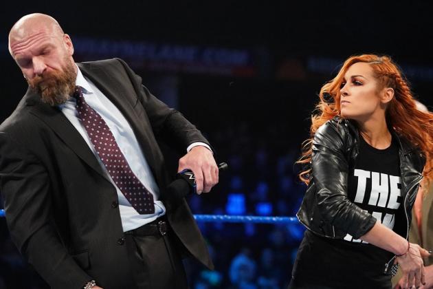 Becky Lynch slapping Triple H on SmackDown.
