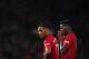 Manchester United's French striker Anthony Martial (L) and Manchester United's French midfielder Paul Pogba (R) take a break during the English Premier League football match between Manchester United and Bournemouth at Old Trafford in Manchester, north west England, on December 30, 2018. (Photo by Paul ELLIS / AFP) / RESTRICTED TO EDITORIAL USE. No use with unauthorized audio, video, data, fixture lists, club/league logos or 'live' services. Online in-match use limited to 120 images. An additional 40 images may be used in extra time. No video emulation. Social media in-match use limited to 120 images. An additional 40 images may be used in extra time. No use in betting publications, games or single club/league/player publications. / (Photo credit should read PAUL ELLIS/AFP/Getty Images)