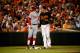 BALTIMORE, MD - JULY 10: Bryce Harper #34 of the Washington Nationals and Manny Machado #13 of the Baltimore Orioles talk during their game at Oriole Park at Camden Yards on July 10, 2015 in Baltimore, Maryland. (Photo by Rob Carr/Getty Images)