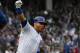 Chicago Cubs' Willson Contreras (40) raises his arm after he hit a two run home run during the fifth inning of a baseball game against the St. Louis Cardinals on Sunday, Sept. 30, 2018, in Chicago. (AP Photo/Matt Marton)