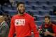 New Orleans Pelicans forward Anthony Davis warms up for the team's NBA basketball game against the Minnesota Timberwolves, his first game back since injuring his left index finger last month, in New Orleans, Friday, Feb. 8, 2019. (AP Photo/Scott Threlkeld)