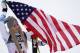 Third placed United States' Lindsey Vonn celebrates on the podium after the women's downhill race, at the alpine ski World Championships in Are, Sweden, Sunday, Feb. 10, 2019. (AP Photo/Giovanni Auletta)