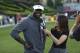 Michael Vick is interviewed on field during the American Flag Football League (AFFL) U.S. Open of Football tournament, Sunday, July 8, 2018 in Kennesaw, Ga. (Kevin D. Liles/AP Images for American Flag Football League)