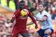 Liverpool's Guinean midfielder Naby Keita (L) vies with Bournemouth's English midfielder Dan Gosling (R) during the English Premier League football match between Liverpool and Bournemouth at Anfield in Liverpool, north west England on February 9, 2019. (Photo by Paul ELLIS / AFP) / RESTRICTED TO EDITORIAL USE. No use with unauthorized audio, video, data, fixture lists, club/league logos or 'live' services. Online in-match use limited to 120 images. An additional 40 images may be used in extra time. No video emulation. Social media in-match use limited to 120 images. An additional 40 images may be used in extra time. No use in betting publications, games or single club/league/player publications. / (Photo credit should read PAUL ELLIS/AFP/Getty Images)