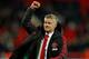 Manchester United's Norwegian caretaker manager Ole Gunnar Solskjaer applauds the fans following the English Premier League football match between Tottenham Hotspur and Manchester United at Wembley Stadium in London, on January 13, 2019. - Manchester United won 1-0. (Photo by Adrian DENNIS / AFP) / RESTRICTED TO EDITORIAL USE. No use with unauthorized audio, video, data, fixture lists, club/league logos or 'live' services. Online in-match use limited to 120 images. An additional 40 images may be used in extra time. No video emulation. Social media in-match use limited to 120 images. An additional 40 images may be used in extra time. No use in betting publications, games or single club/league/player publications. / (Photo credit should read ADRIAN DENNIS/AFP/Getty Images)