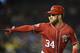 FILE - In this Sept. 8, 2018, file photo, Washington Nationals' Bryce Harper pointing to the dugout after he hit a two-run home run during the seventh inning of the second baseball game of a doubleheader against the Chicago Cubs, in Washington. As the start of spring training approaches, the Washington Nationals are waiting right along with the rest of the world to find out where Harper will be playing next season. (AP Photo/Nick Wass, File)
