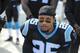 FILE - In this Nov. 25, 2018, file photo, Carolina Panthers strong safety Eric Reid (25) knells along the sideline during the national aAnthem before the start of an NFL football game against the Seattle Seahawks in Charlotte, N.C. Reid says he is “not surprised” he has been drug tested by the NFL six times in the past 11 weeks, his Panthers teammates and coaches are growing increasingly annoyed at the frequency of the league’s “random” policy. (AP Photo/Mike McCarn, File)