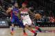Washington Wizards guard Bradley Beal (3) drives on Detroit Pistons guard Bruce Brown (6) during the second half of an NBA basketball game, Monday, Feb. 11, 2019, in Detroit. (AP Photo/Carlos Osorio)