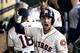 Houston Astros' Alex Bregman celebrates in the dugout after hitting a two-run home run against the Boston Red Sox during the third inning of a baseball game Saturday, June 2, 2018, in Houston. (AP Photo/David J. Phillip)