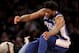 NEW YORK, NEW YORK - FEBRUARY 13: Joel Embiid #21 of the Philadelphia 76ers leaps over the first row in attempt to keep the ball in bounds in the second half against the New York Knicks at Madison Square Garden on February 13, 2019 in New York City. NOTE TO USER: User expressly acknowledges and agrees that, by downloading and or using this photograph, User is consenting to the terms and conditions of the Getty Images License Agreement. (Photo by Elsa/Getty Images)