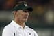 In this photo made Sept. 19, 2009, University of South Florida head coach Jim Leavitt watches his team play Charleston Southern during a NCAA college football game, in Tampa, Fla. Leavitt has been fired following an investigation of an allegation that he struck one of his players in the locker room. USF would not confirm Leavitt's dismissal, but university spokeswoman Lara Wade said all questions would be answered when the school released a report later Friday, Jan. 8, 2010. (AP Photo/Chris O'Meara)