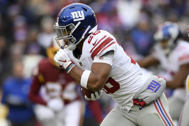 New York Giants running back Saquon Barkley (26) runs for a 78-yard touchdown during the first half of an NFL football game against the Washington Redskins, Sunday, Dec. 9, 2018, in Landover, Md. (AP Photo/Nick Wass)