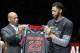 New Orleans Pelicans General Manager Dell Demps, second from left, presents the All Star Game jersey to striker Anthony Davis, right, before an NBA basketball game against Utah Jazz in New Orleans. New Orleans, Wednesday, February 8, 2017. Jazz won 127-94. (AP Photo / Max Becherer)