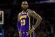 Los Angeles Lakers' LeBron James looks on during the second half of an NBA basketball game against the Philadelphia 76ers, Sunday, Feb. 10, 2019, in Philadelphia. The 76ers won 143-120. (AP Photo/Chris Szagola)