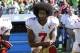 San Francisco 49ers' Colin Kaepernick kneels during the national anthem before an NFL football game against the Seattle Seahawks, Sunday, Sept. 25, 2016, in Seattle. (AP Photo/Ted S. Warren)