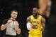 Los Angeles Lakers forward LeBron James (23) argues with an official during the first half of an NBA basketball game against the Atlanta Hawks Tuesday, Feb. 12, 2019, in Atlanta. (AP Photo/John Bazemore)