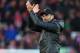 Liverpool's German manager Jurgen Klopp applauds supporters after the English Premier League football match between Liverpool and Bournemouth at Anfield in Liverpool, north west England on February 9, 2019. - Liverpool won the game 3-0. (Photo by Paul ELLIS / AFP) / RESTRICTED TO EDITORIAL USE. No use with unauthorized audio, video, data, fixture lists, club/league logos or 'live' services. Online in-match use limited to 120 images. An additional 40 images may be used in extra time. No video emulation. Social media in-match use limited to 120 images. An additional 40 images may be used in extra time. No use in betting publications, games or single club/league/player publications. / (Photo credit should read PAUL ELLIS/AFP/Getty Images)