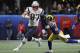 New England Patriots' Rob Gronkowski (87) runs against Los Angeles Rams' Nickell Robey-Coleman (23) during the first half of the NFL Super Bowl 53 football game Sunday, Feb. 3, 2019, in Atlanta. (AP Photo/Jeff Roberson)