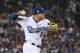 LOS ANGELES, CA - OCTOBER 26: Manny Machado #8 of the Los Angeles Dodgers fields the ball during the eleventh inning against the Boston Red Sox in Game Three of the 2018 World Series at Dodger Stadium on October 26, 2018 in Los Angeles, California. (Photo by Harry How/Getty Images)