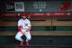 Washington Nationals Bryce Harper, looks at the baseball field from their dug out before the start of the Nationals last home game of the season against the Miami Marlins in Washington, Wednesday, Sept. 26, 2018. (AP Photo/Manuel Balce Ceneta)