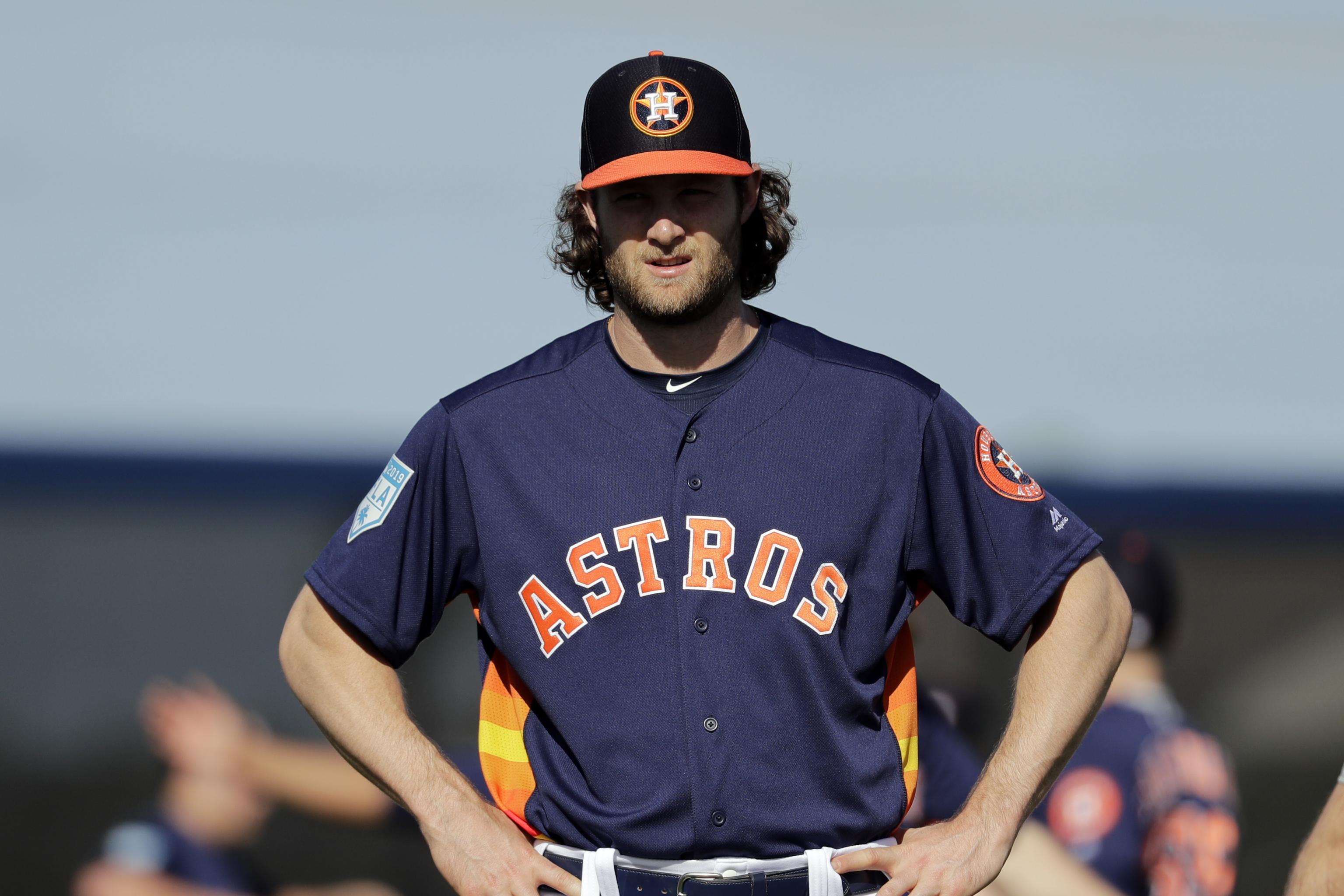 Astros split doubleheader, Gerrit Cole scratched after warm-up