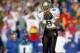 LAWRENCE, KS - NOVEMBER 14: Defensive back T.J. Cunningham #8 of the University of Colorado at Boulder Buffaloes intercepts the ball against the University of Kansas Jayhawks at Memorial Stadium in Lawrence, Kansas, on November 14, 1992. The Buffaloes won 25-18. (Photo by Bernstein Associates/Getty Images)