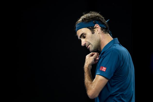 MELBOURNE, AUSTRALIA - JANUARY 20: Roger Federer of Switzerland reacts in his fourth round match against Stefanos Tsitsipas of Greece during day seven of the 2019 Australian Open at Melbourne Park on January 20, 2019 in Melbourne, Australia. (Photo by Fred Lee/Getty Images)