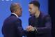 Former President Barack Obama, left, hugs Golden State Warriors basketball player Stephen Curry after speaking at the My Brother's Keeper Alliance Summit in Oakland, Calif., Tuesday, Feb. 19, 2019. (AP Photo/Jeff Chiu)
