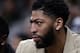 New Orleans Pelicans forward Anthony Davis watches from the bench in street clothes during the first half of the team's NBA basketball game against the San Antonio Spurs in San Antonio, Saturday, Feb. 2, 2019. (AP Photo/Eric Gay)
