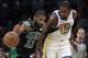 Kyrie Irving (11), Boston Celtics goalkeeper, dribbles against Golden State Warriors forward Kevin Durant (35) in the first quarter of an NBA basketball game on Saturday, January 26 2019 in Boston. (AP Photo / Elise Amendola)