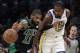 Boston Celtics guard Kyrie Irving (11) dribbles against Golden State Warriors forward Kevin Durant (35) in the first quarter of an NBA basketball game, Saturday, Jan. 26, 2019, in Boston. (AP Photo/Elise Amendola)