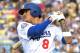 LOS ANGELES, CA - JULY 31: Manny Machado #8 of the Los Angeles Dodgers warms up in the batting circle during the game against the Milwaukee Brewers at Dodger Stadium on July 31, 2018 in Los Angeles, California. (Photo by Jayne Kamin-Oncea/Getty Images)'n