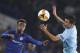 Chelsea's Callum Hudson-Odoi, left, and Malmo's Behrang Safari vie for the ball during the round of 32, second leg, Europa League soccer match between Chelsea and Malmo FF at Stamford Bridge stadium in London, Thursday Feb. 21, 2019. (AP Photo/Frank Augstein)