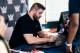 Kevin Owens signing autographs.