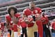 FILE - In this Oct. 2, 2016 file photo, San Francisco 49ers quarterback Colin Kaepernick, left, and safety Eric Reid kneel during the national anthem before an NFL football game against the Dallas Cowboys, in Santa Clara, Calif. Colin Kaepernick and Eric Reid have reached settlements on their collusion lawsuits against the NFL, the league said Friday, Feb. 19, 2019.(AP Photo/Marcio Jose Sanchez, File)