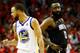 HOUSTON, TX - MAY 28: Stephen Curry #30 of the Golden State Warriors reacts as James Harden #13 of the Houston Rockets looks on in the third quarter of Game Seven of the Western Conference Finals of the 2018 NBA Playoffs at Toyota Center on May 28, 2018 in Houston, Texas. NOTE TO USER: User expressly acknowledges and agrees that, by downloading and or using this photograph, User is consenting to the terms and conditions of the Getty Images License Agreement. (Photo by Ronald Martinez/Getty Images)