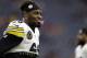Pittsburgh Steelers running back Le'Veon Bell warms up before an NFL football game against the Houston Texans Monday, Dec. 25, 2017, in Houston. (AP Photo/Michael Wyke)