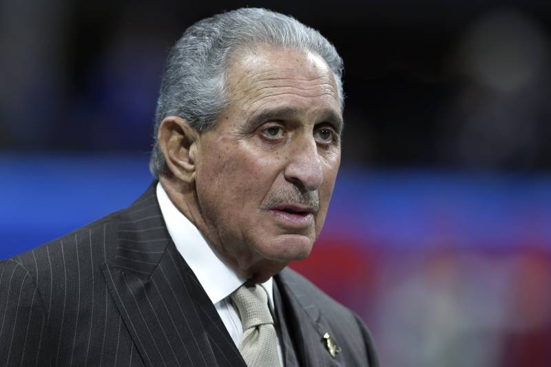 Atlanta Falcons owner Arthur Blank walks on the field before the NFL Super Bowl 53 football game between the Los Angeles Rams and the New England Patriots Sunday, Feb. 3, 2019, in Atlanta (AP Photo/Carolyn Kaster)