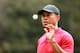 MEXICO CITY, MEXICO - FEBRUARY 24: Tiger Woods of the United States catches a ball on the 12th green during the final round of World Golf Championships-Mexico Championship at Club de Golf Chapultepec on February 24, 2019 in Mexico City, Mexico. (Photo by Hector Vivas/Getty Images)